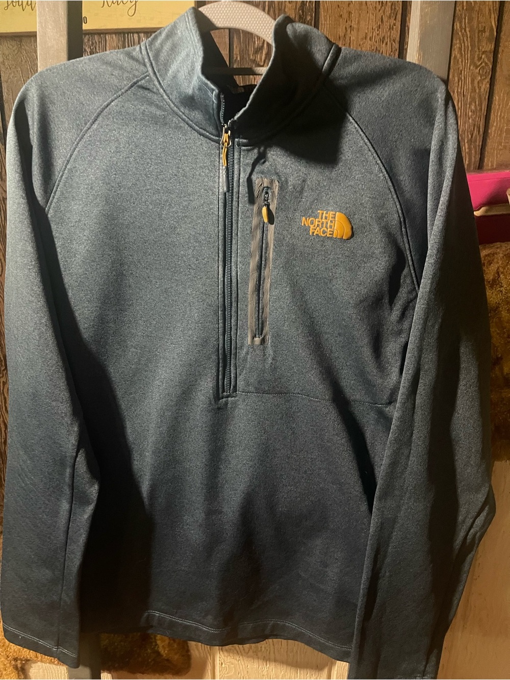 The North Face Men's Charcoal Gray Half-Zip Fleece with Gold Logo